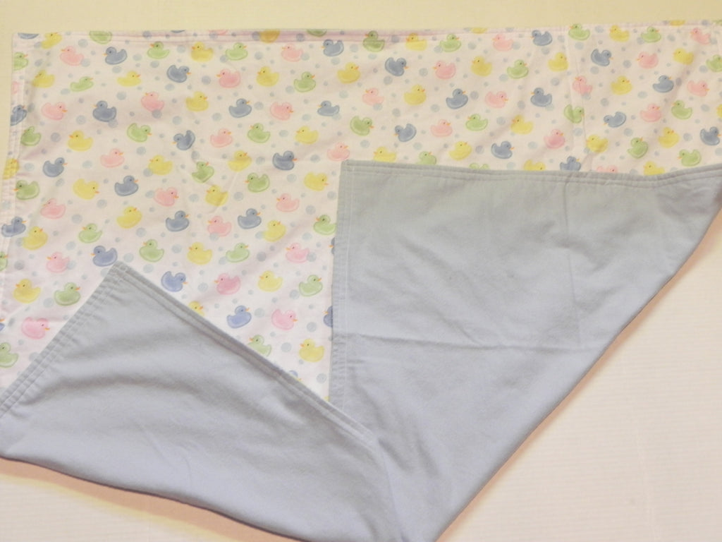 Pastel baby duck print flannel blanket with blue flannel backing