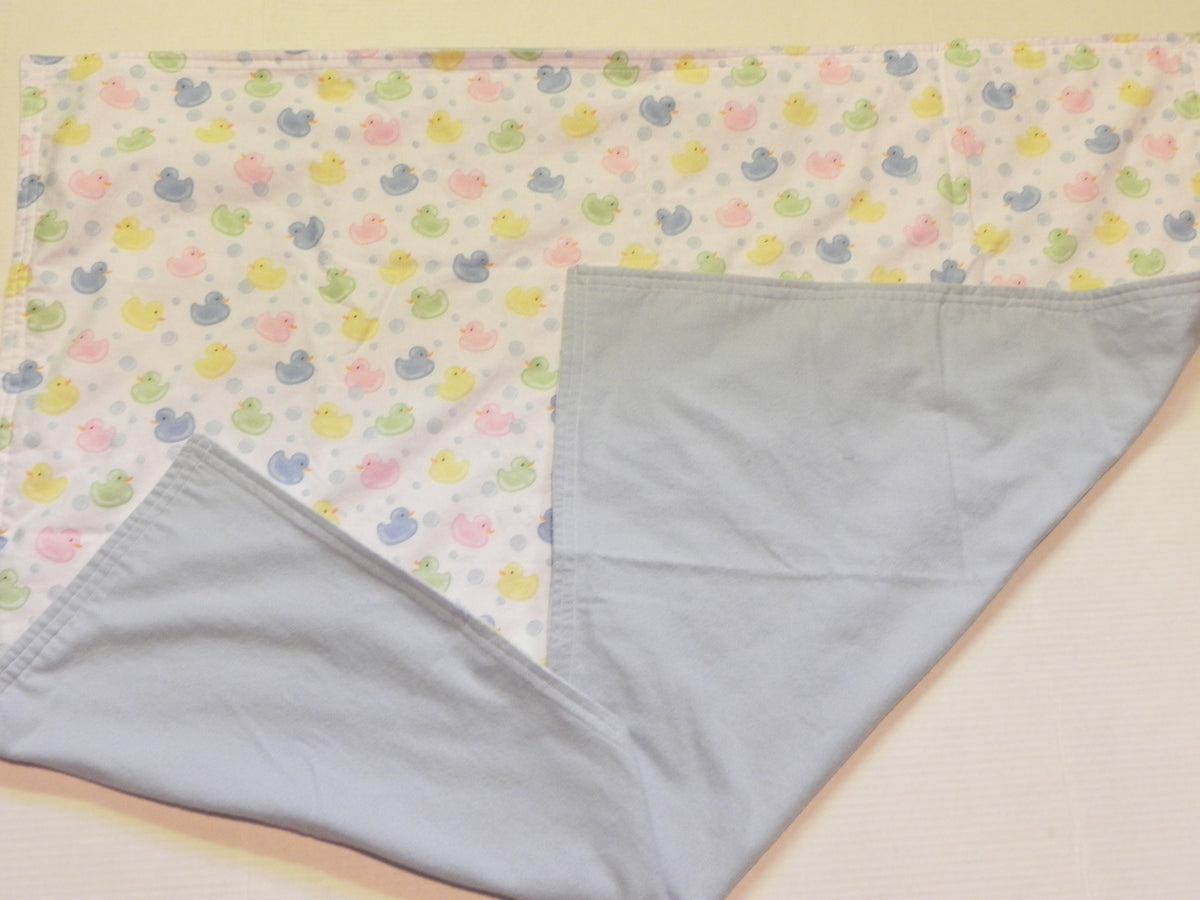 Pastel baby duck print flannel blanket with blue flannel backing